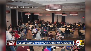 After NY attack, community celebrates last night of Hanukkah