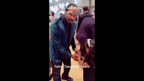 Father dances with 7 year old Daughter