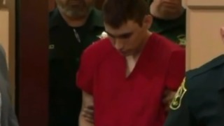 School shooting suspect held without bond