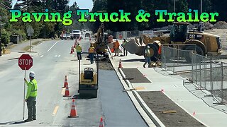 Paving Truck and Trailer, With Spreading. Trucking and Construction.