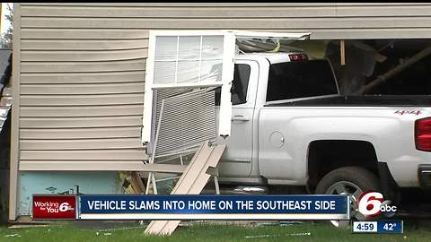 Truck slams into home on Indianapolis' southwest side