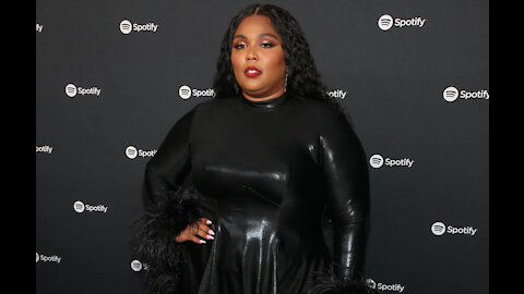 Lizzo drunkenly slid into Chris Evans' direct messages - and he responded!