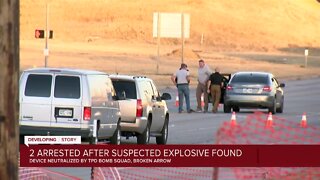 2 arrested after suspected explosive found