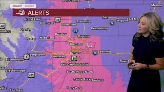 Band of snow rolls through early across Denver metro area