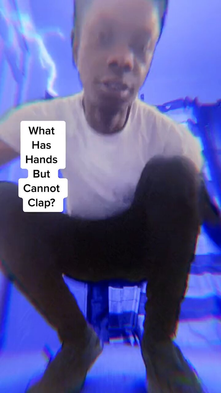 What has hands but can t clap 