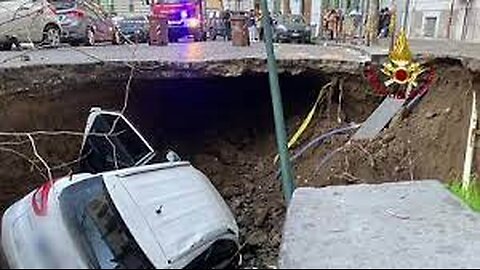 Huge sinkhole in Naples swallows two cars