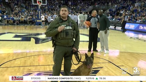 Marine Veteran and his Police Service dog honored with award at Creighton game