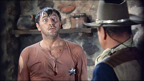 John Wayne clobbers Robert Mitchum on the head in El Dorado 1967