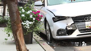 Pickup truck careens into parked cars causing major damage