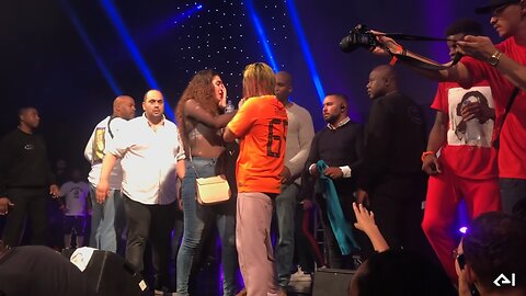 6ix9ine saves a fan of aggressive security & Willam Asher throws 6ix9ine's shoe into the audience