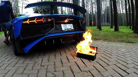 Lamborghini owner lights a fire with his car exhaust, then has to act quickly