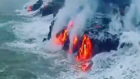 Pacific Ocean, Hawaii - Magma flowing into the water