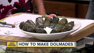 Enjoying Dolmades, a Greek appetizer, with Nick Vojnovic