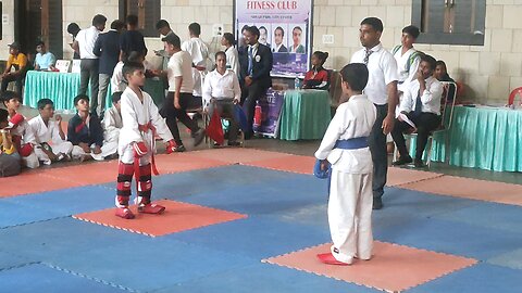 my son fight for medal in martial art kumite