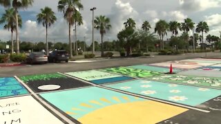 Jensen Beach High School seniors continue tradition painting school parking spots