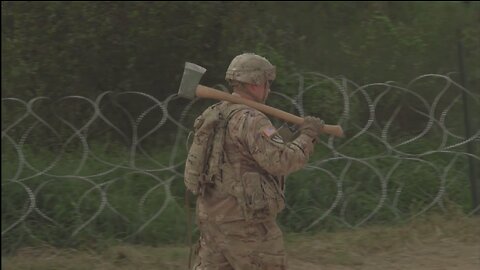 US Soldiers Apply Concertina Wire On Border At Hildago, TX.