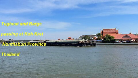 Tugboat and Barge passing at Koh Kret in Nonthaburi Thailand