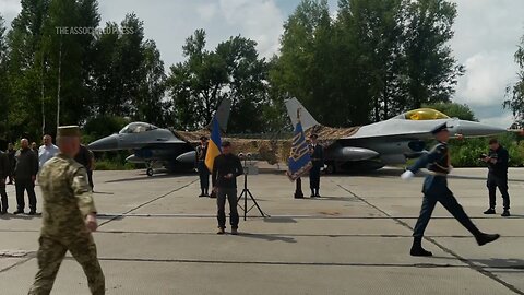 Ukraine's Zelenskyy displays newly arrived F-16 fighter jets to combat Russia in the air
