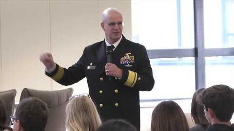 Navy Rear Admiral Carl Lahti heads back to his Alma Mater