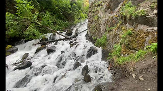 Beautiful Alaska Waterfall In Nature