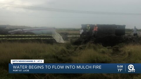 Water begins flowing in effort to extinguish Port St. Lucie mulch fire