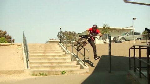 BMX rail slide trick results in pole position