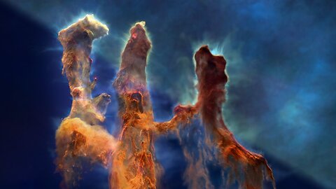 The Pillars of Creation and the Interplay of Stars and Dust