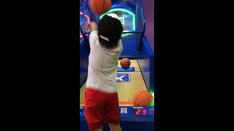 3 Year Old Hooping on Basketball Arcade Game