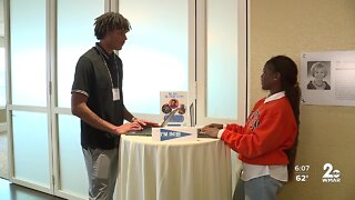 Baltimore City School students celebrating college acceptance letters