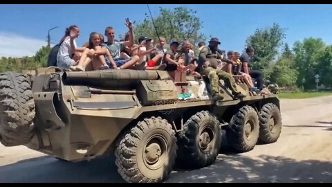 Russian soldiers take local kids to school somewhere in Ukraine