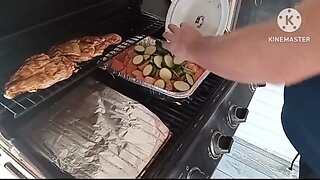 Outdoor cooking veggies and chicken on the grill