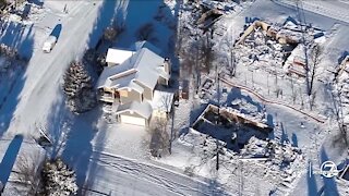 Neighbors help put out separate fire as Marshall Fire loomed in background