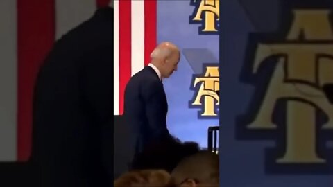 A Very Confused Joe Biden Shakes Hands with Thin Air