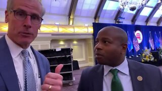 Cavalier Johnson speaks with Charles Benson at RNC meeting