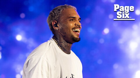 Chris Brown throws fan's phone into the crowd for filming while on stage