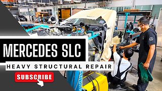 Heavy structural repair of Mercedes-Benz SLC on Celette bench with side and overhead gantries