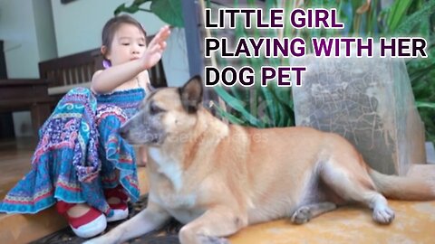 Little girl playing with her dog pet 😂😂