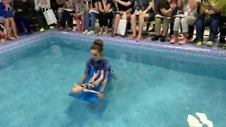 6-month-old baby floats in pool without any support