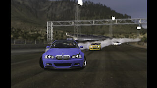 BMWs drifting tandem