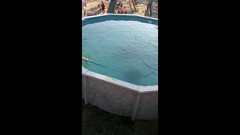 the pool is getting cleaned