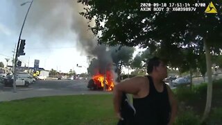 Police officer rescues wheelchair-bound man moments before vehicle ignites