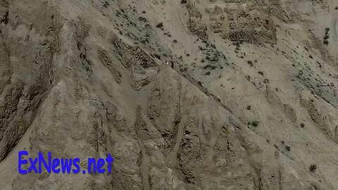 Mountain Bikers ride down 300 meter cliff face