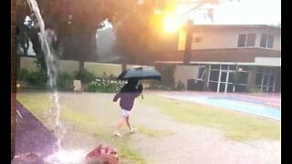 Lightning strikes dangerously close to boy