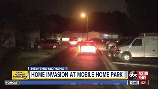 Suspects hold two people at gunpoint during Tampa home invasion