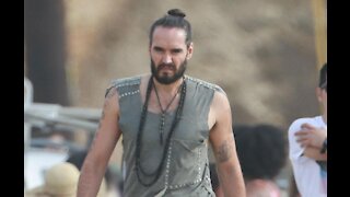 Russell Brand questions the effectiveness of masks