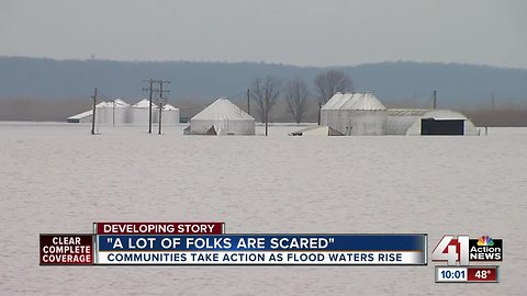 Communities take action as floodwaters rise