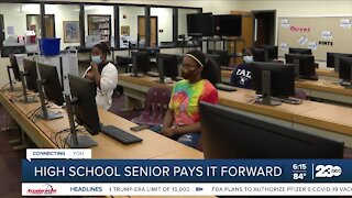High school senior pays it forward