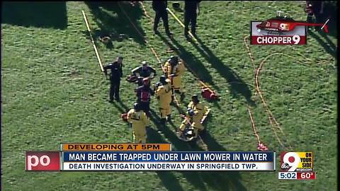 Man dies after becoming trapped under lawn mower