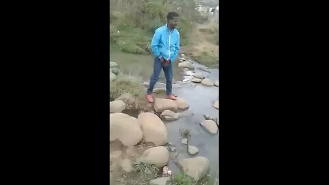 Watch this drunk man fail to cross the river and falls😂🤯