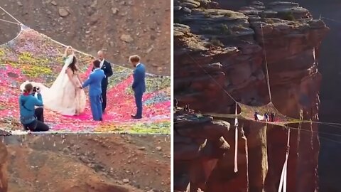 Daredevil couple get married on net suspended 400ft above canyon